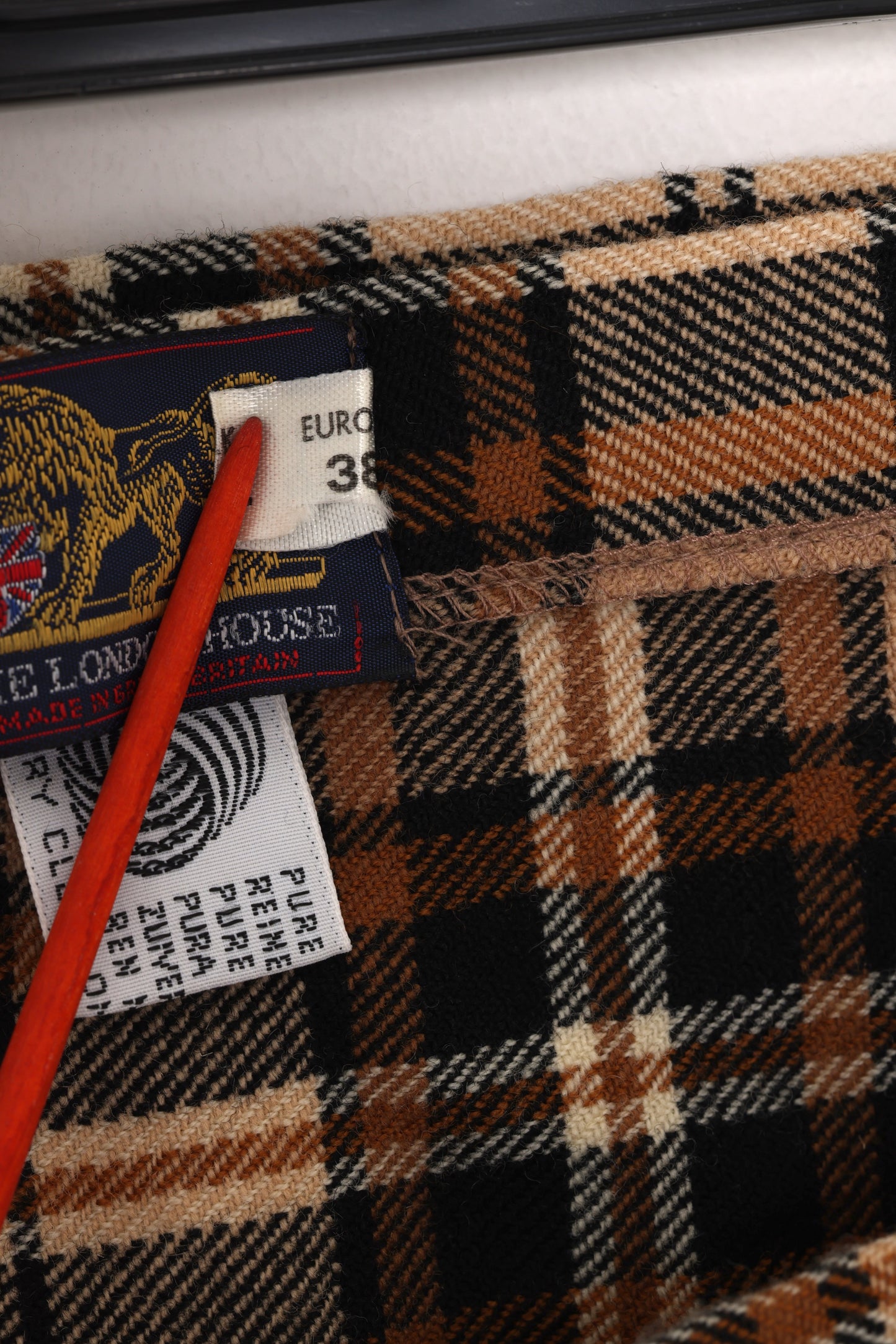 Circa 1975–1990, wool tartan skirt, British manufacture, knife pleats