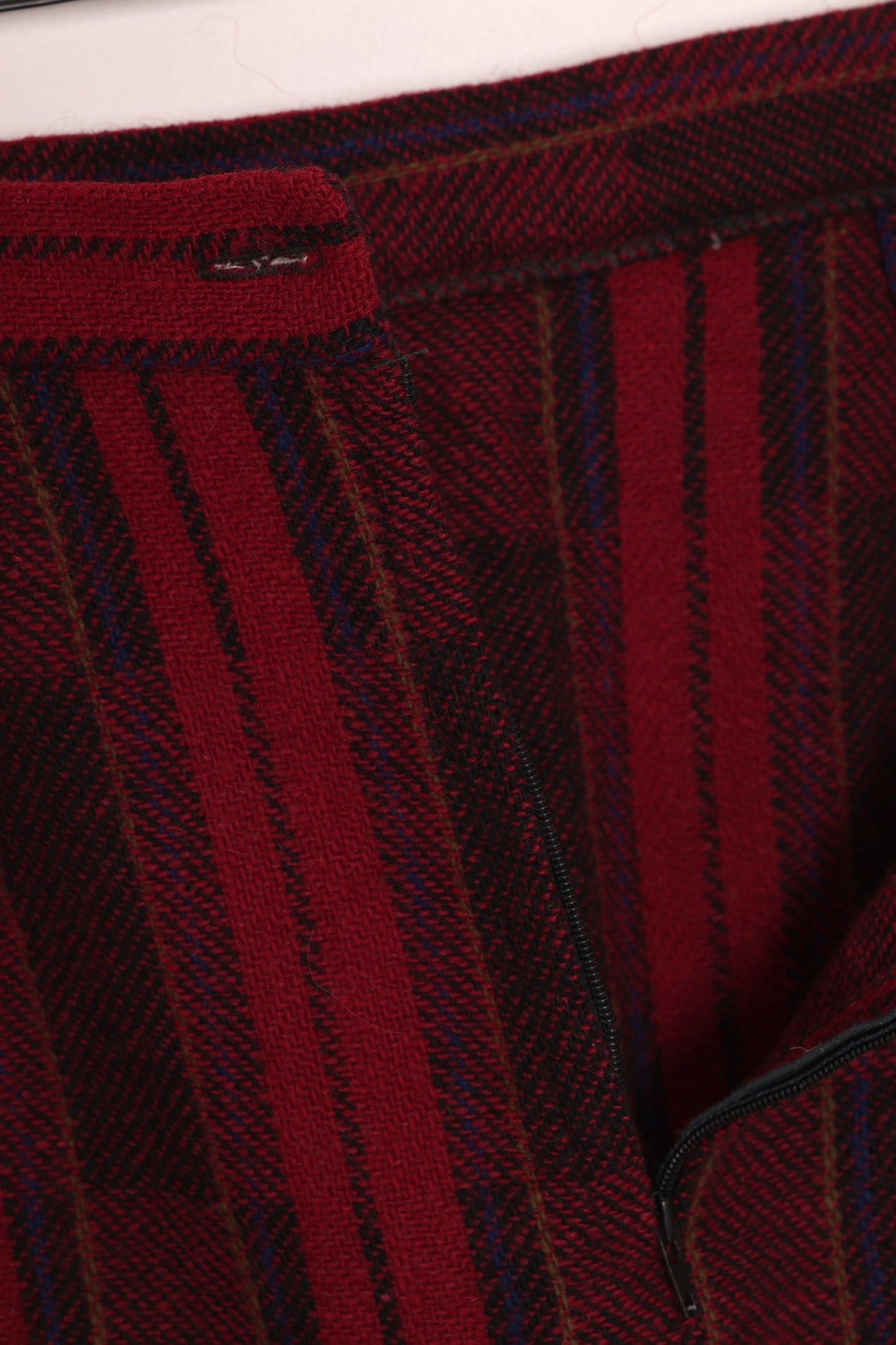 Circa 1975–1985, wool plaid day skirt, A-line structure, small-scale manufacture