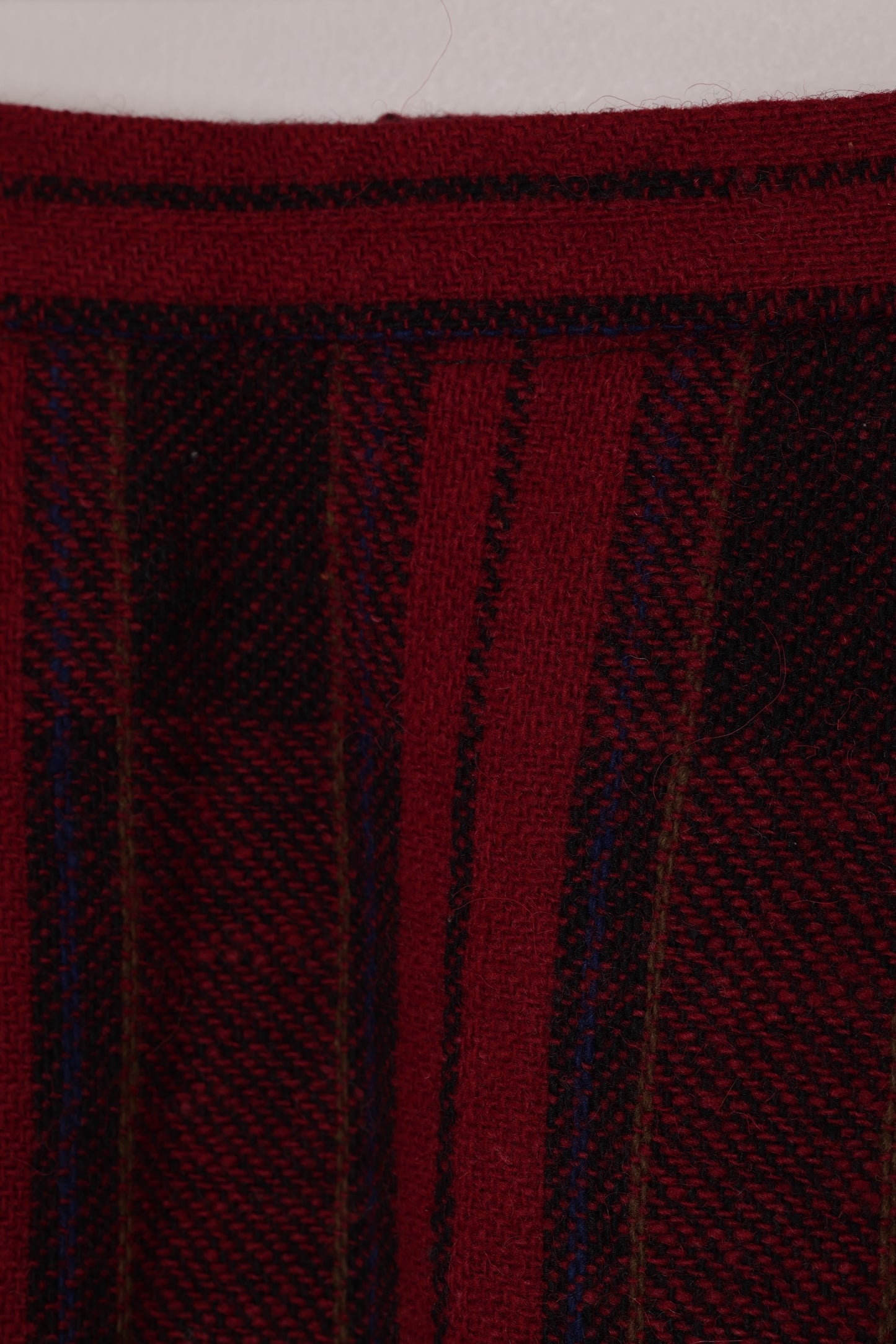 Circa 1975–1985, wool plaid day skirt, A-line structure, small-scale manufacture
