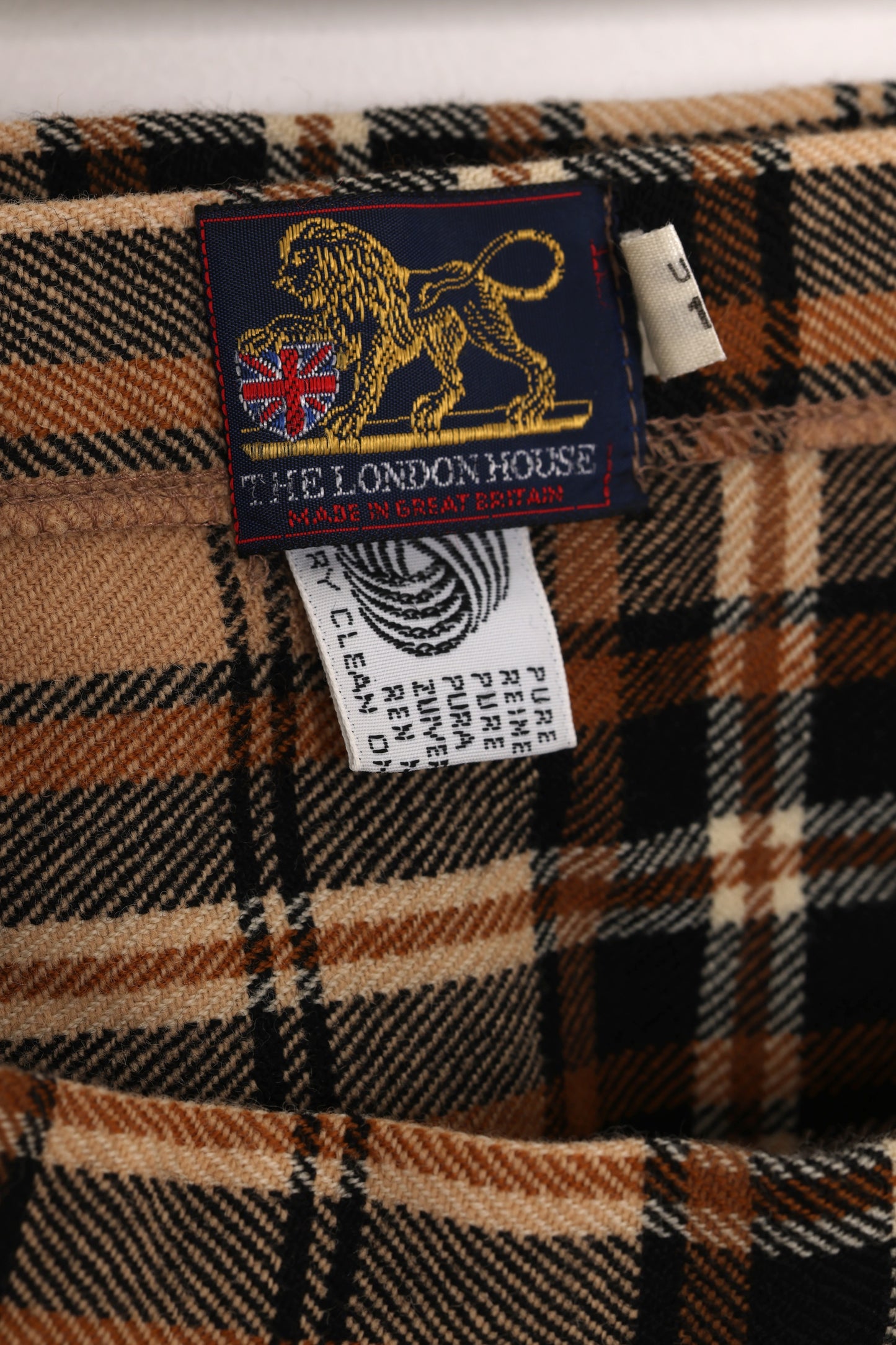 Circa 1975–1990, wool tartan skirt, British manufacture, knife pleats