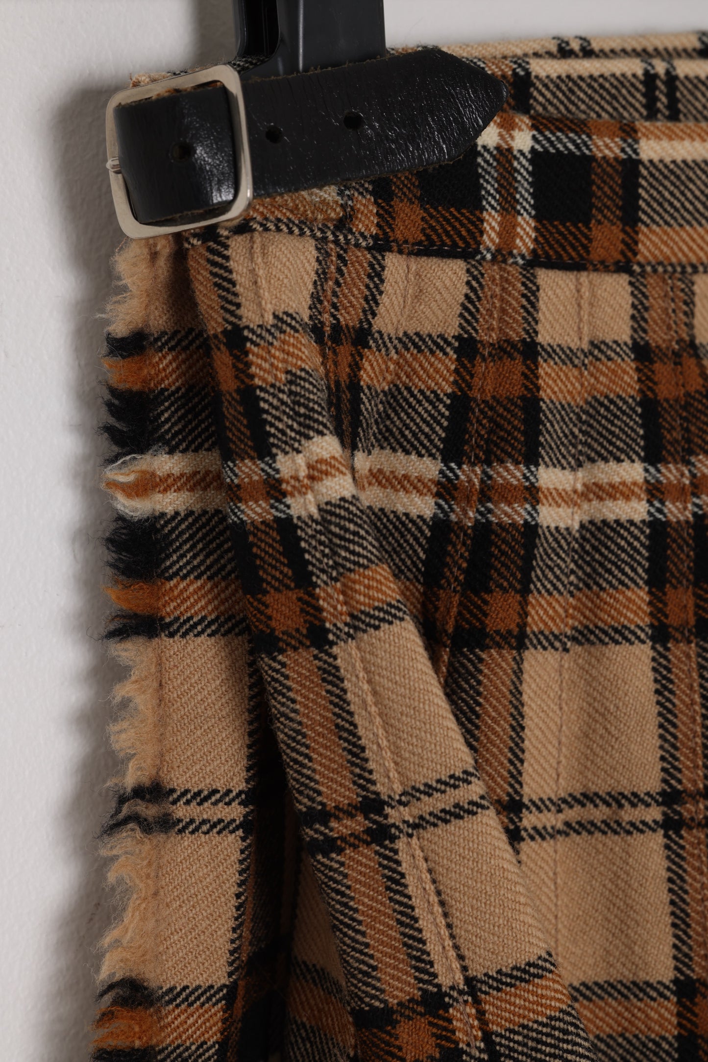 Circa 1975–1990, wool tartan skirt, British manufacture, knife pleats