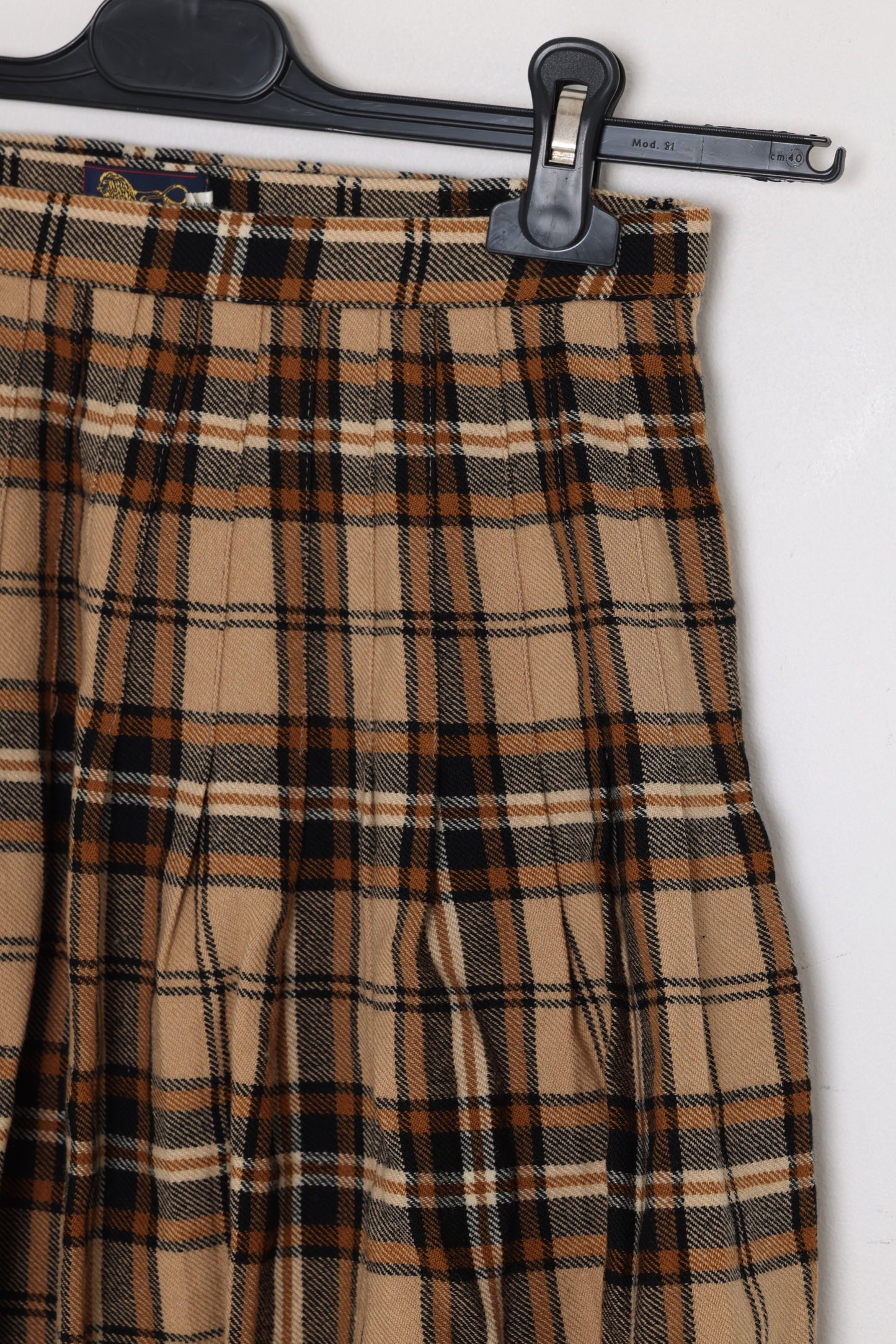 Circa 1975–1990, wool tartan skirt, British manufacture, knife pleats