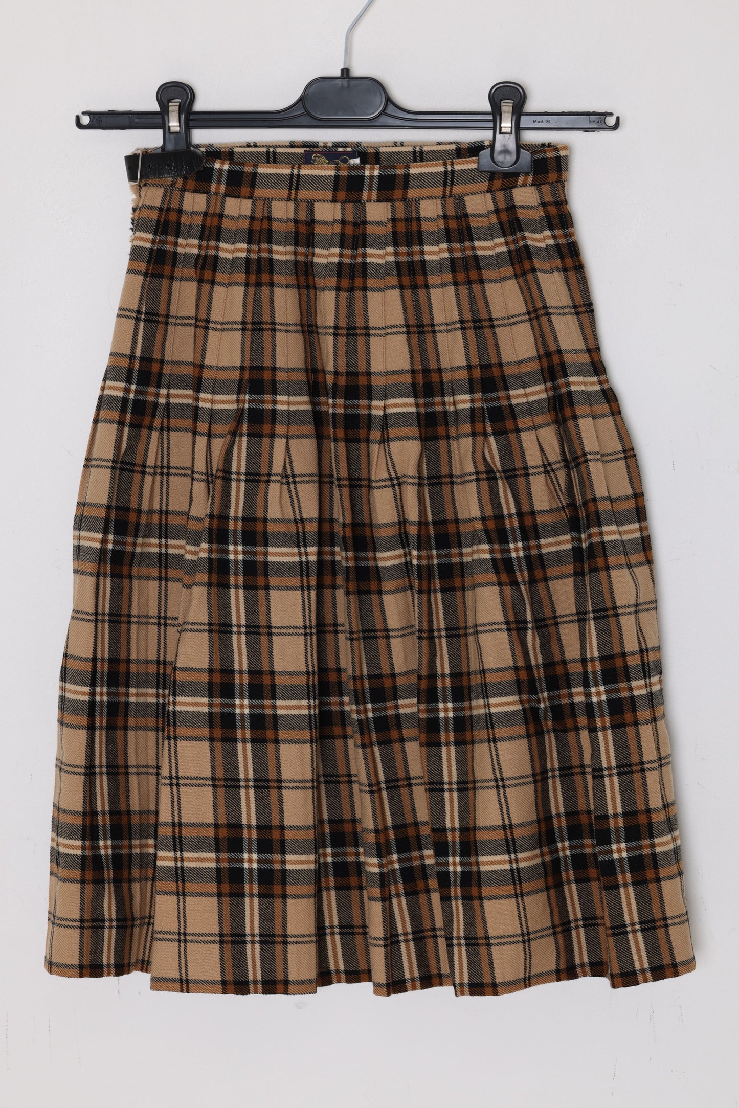 Circa 1975–1990, wool tartan skirt, British manufacture, knife pleats